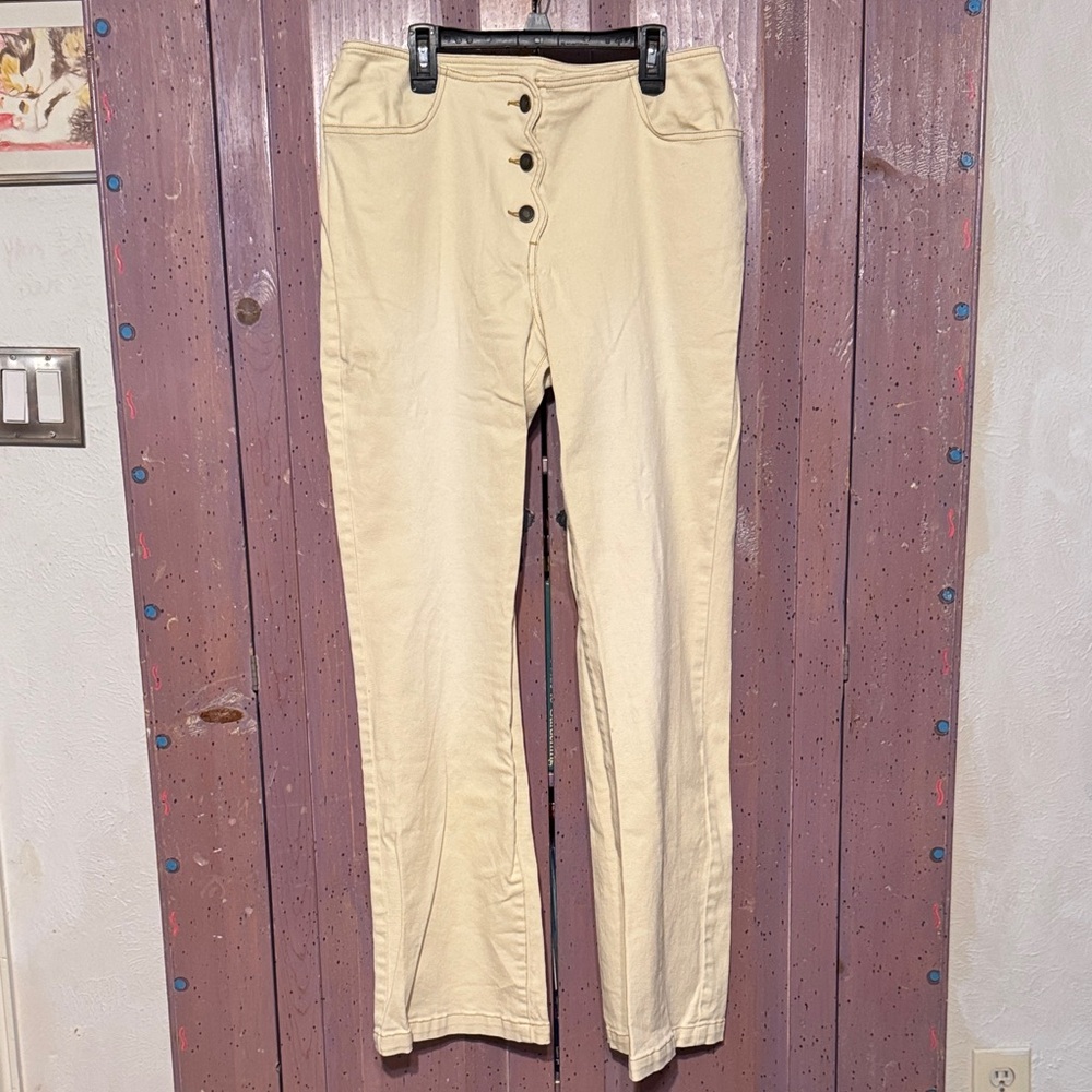 Cream colored button fly jeans